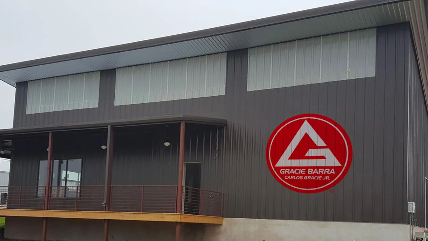 An image of building with the Gracie Barra logo